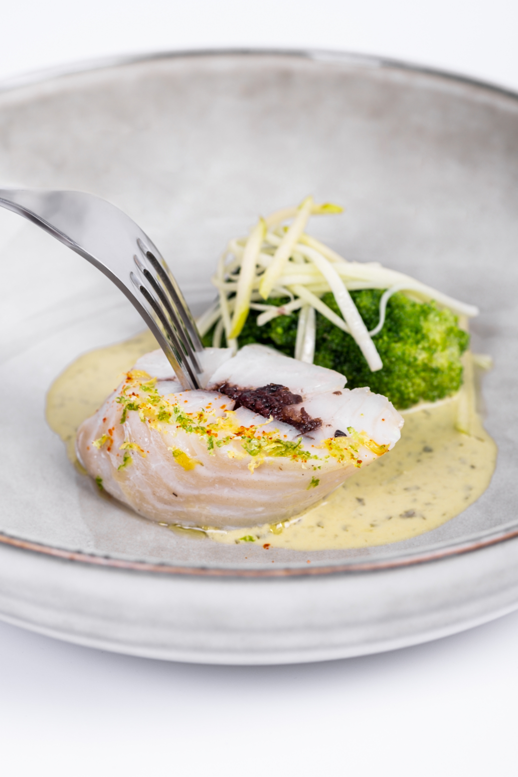 Back of cod poached in a beautiful view served cold, broccoli, tapenade ...